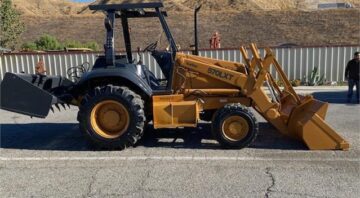 Case 570L XT Skip Loader w/ new wheels